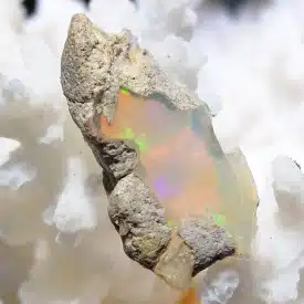 OPALE PRECIEUSE ARC EN CIEL brute (Welo - Ethiopie) - Petit cristal aux reflets arc en ciel de 1.3 grs